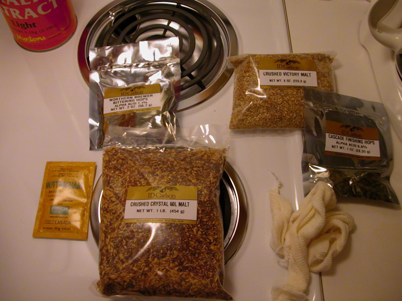 Flavoring grains, malt extract cans, hops, and yeast.