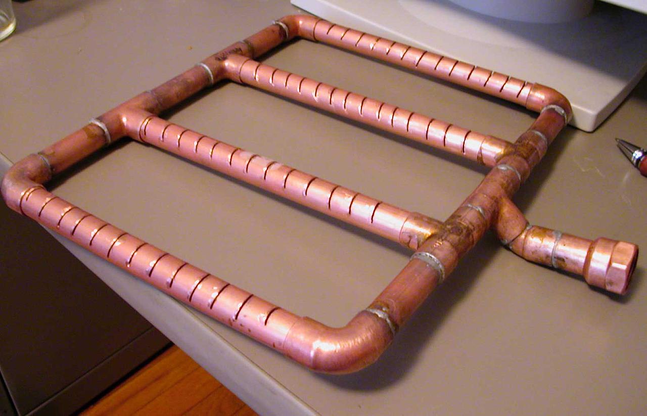 The manifold assembled showing the bend to the drain.