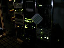 A dark shot of the ISP's racks.  You have to apprecaite USR's gratituous use of LED's in the Total Control units.  Actually its kind of nice to have a quick way of seeing utilitization.